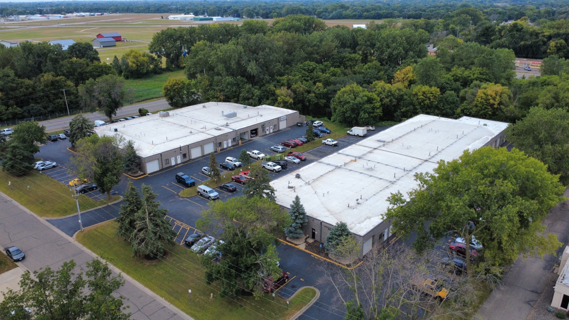 Aerial view of Welcome Square property and parking