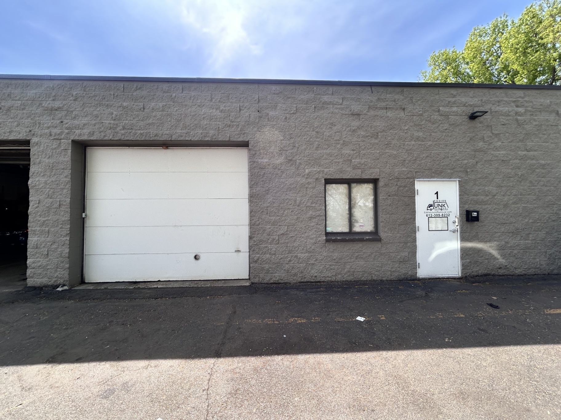 Exterior of Welcome Square showing drive-in door and entry